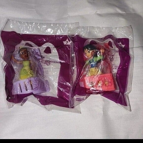 McDonald's- 2 Disney princesses-/ MULAN & TIANA-NEW-SEALED - Picture 1 of 3